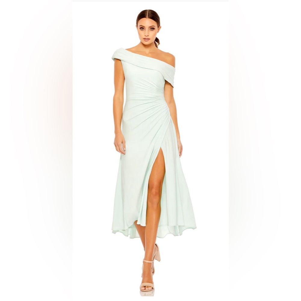 Off shoulder midi light torquois dress with slit in the front.